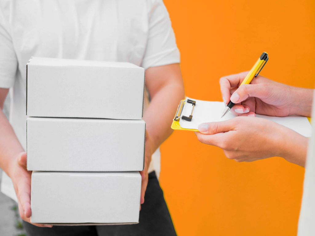 close-up-delivery-g1uy-with-boxes (1).jpg close-up-delivery-g1uy-with-boxes (1).jpg